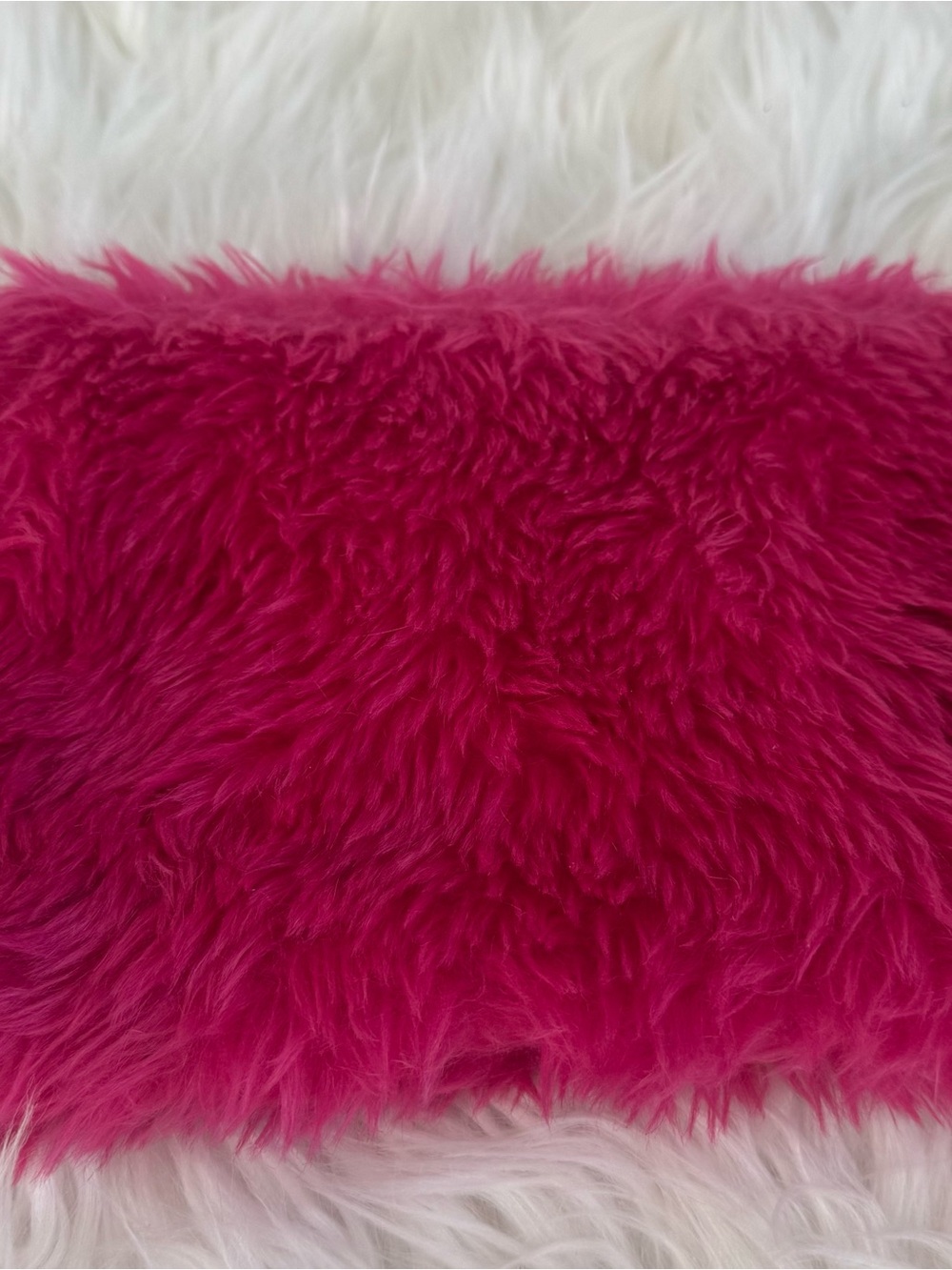Bright pink clutch